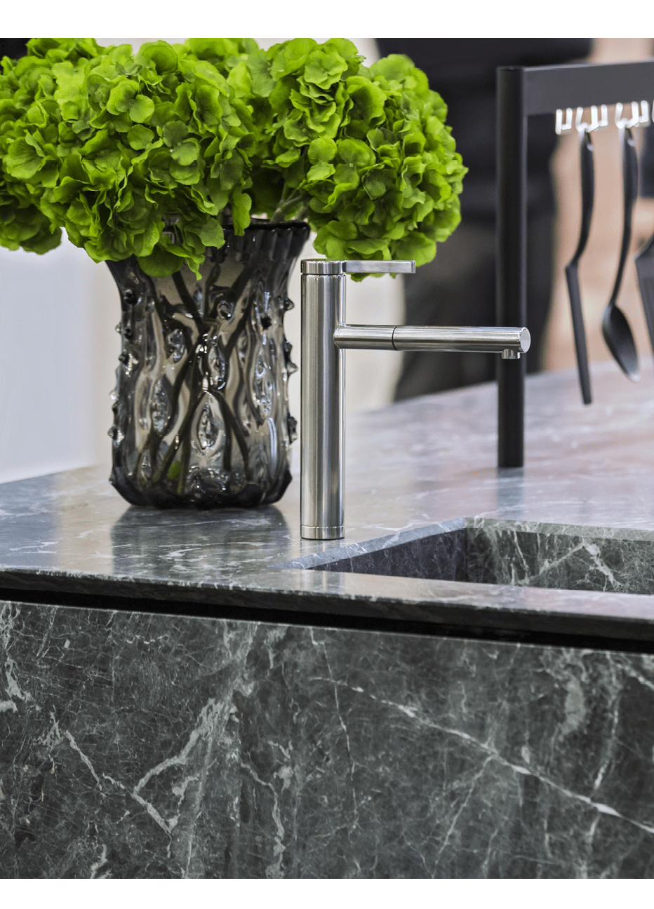 Beautiful modern kitchen design, kitchen faucet and kitchen decor, gray marble kitchen island.