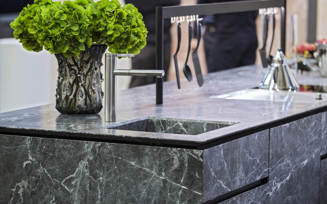 Beautiful modern kitchen design, kitchen faucet and kitchen decor, gray marble kitchen island.