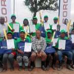 Back left is Derek Dimba. Back row right Lucas Nkhoesa, Corobrik Sales Representative. Front centre Mthembeni Mkhize with twelve trainees who successfully completed the basic bricklaying course on site in the Maphumulo area of KwaZulu-Natal.