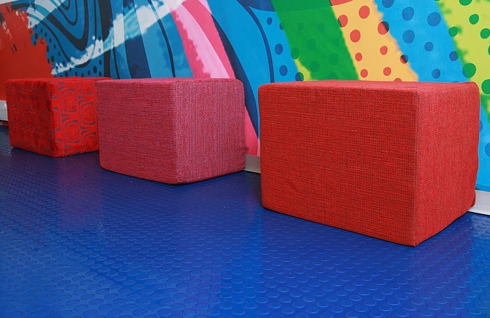 Transit studded PVC floor tiles