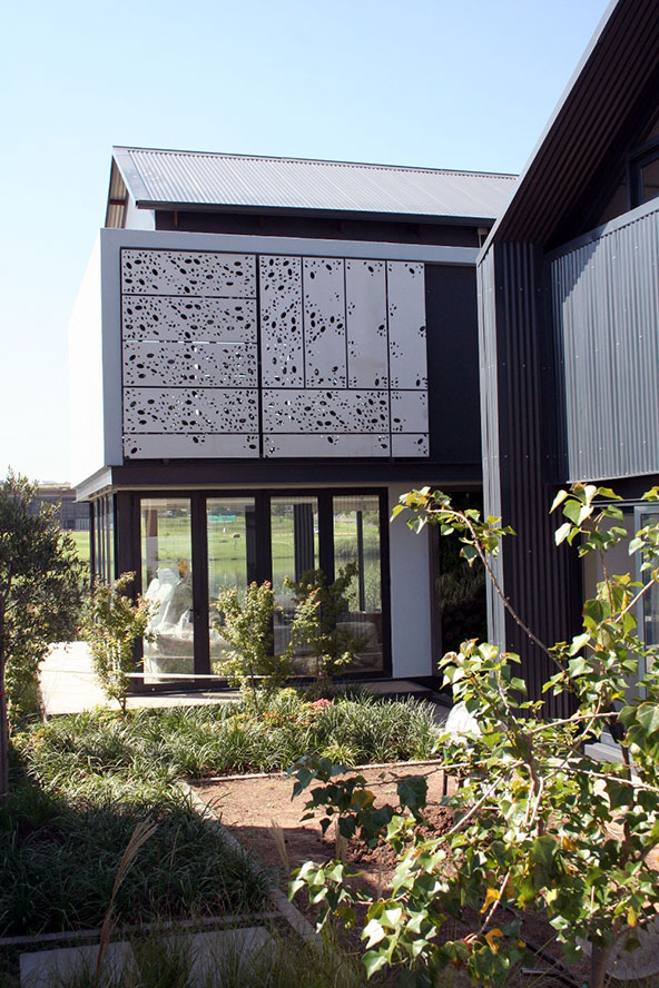 Everite waterjet cut sheets are effective as sunscreens or privacy screens