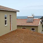 Precast concrete roof tiles