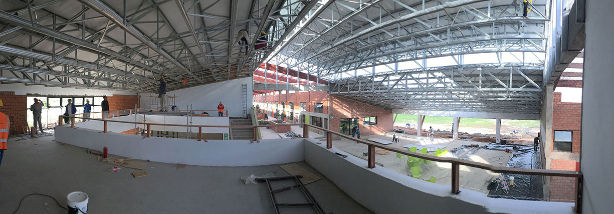 Light Steel Frame building shows its metal in roofing