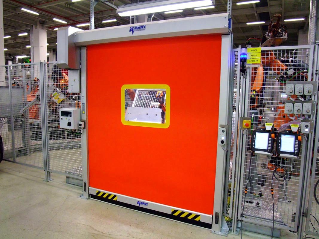 Machine protection doors for safer manufacturing
