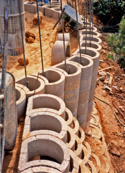 half moon construction for a pool installation on a sloping hill at Bishops Court South Africa