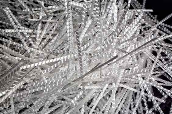 Reinforcing fibers for increased concrete performance