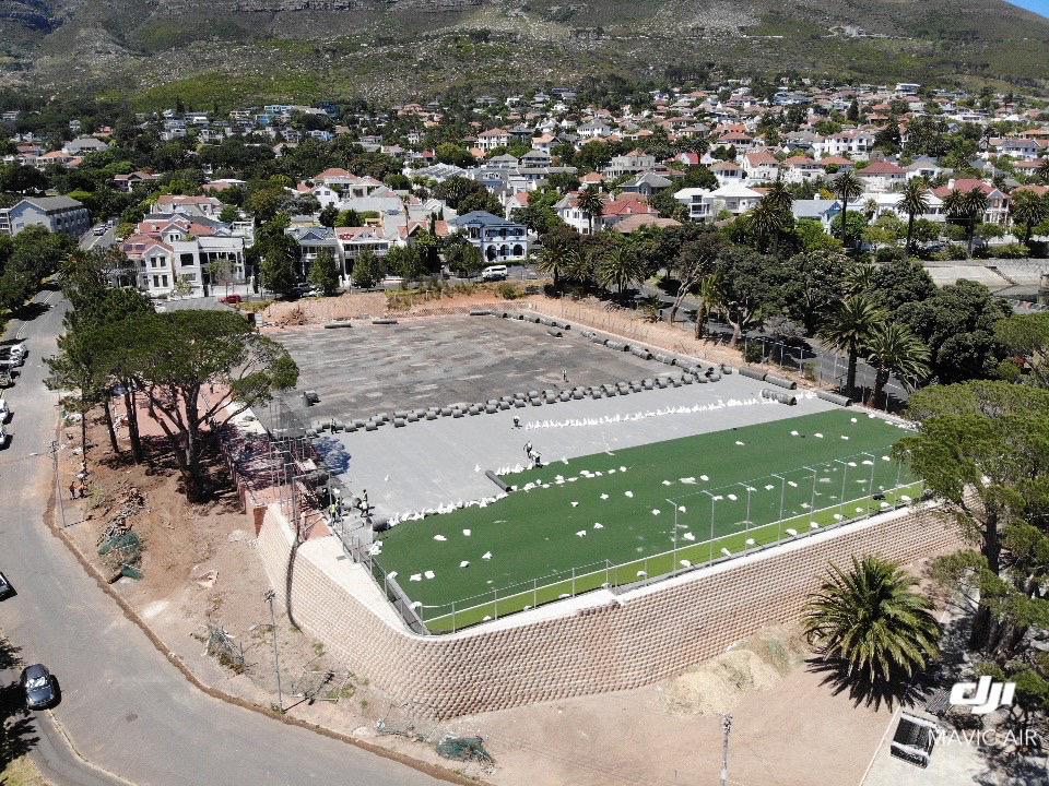 Earth retaining hockey field