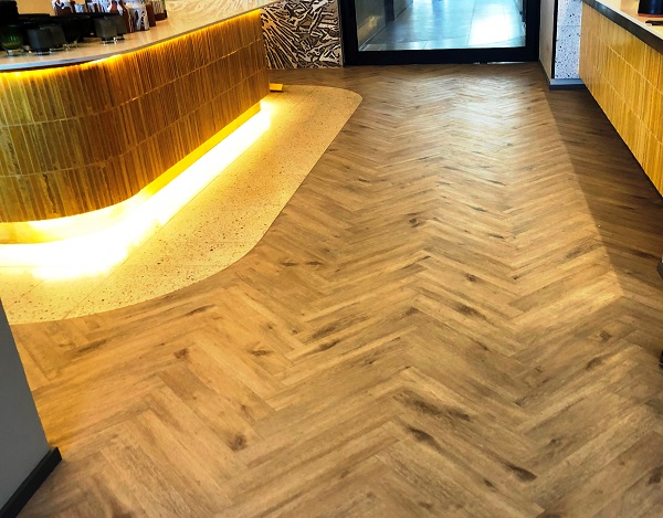 City Lodge flooring with Aspecta 1 (Glued Down) Herringbone